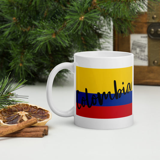 Taza blanca brillante con la Bandera de Colombia